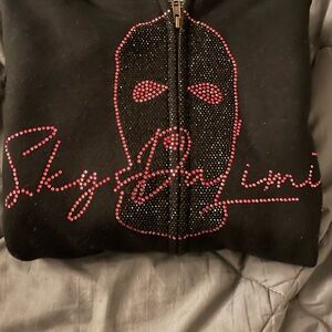 Black Zip Up Sweater with Red Accents